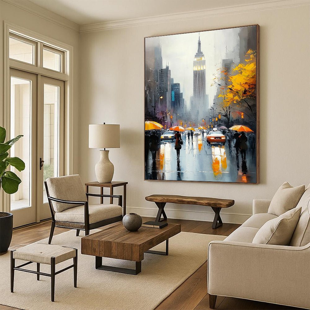A large abstract painting capturing the Empire State Building with vibrant crowds on a rainy day featuring reflections and warm accents.STSC1137