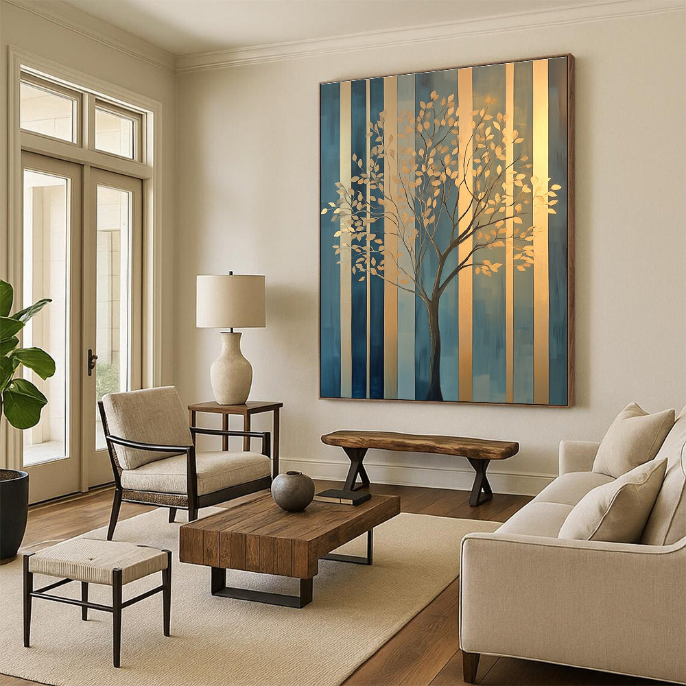Large abstract painting featuring elegant gold tree branches against geometric blue green patterns with soft edges and a warm glow on canvas.STSC1117