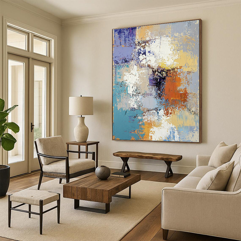 Large abstract oil painting featuring textured layers of blue yellow white gray beige and brown with intricate patterns and emotional depth.STSC584