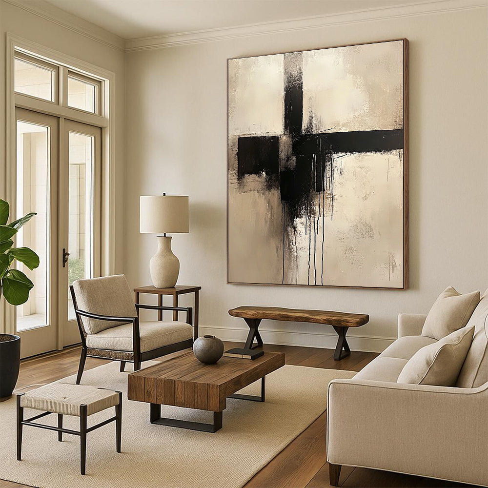 Large abstract painting of a cross in neutral colors featuring a minimalist style and dripping black paint.STSC669