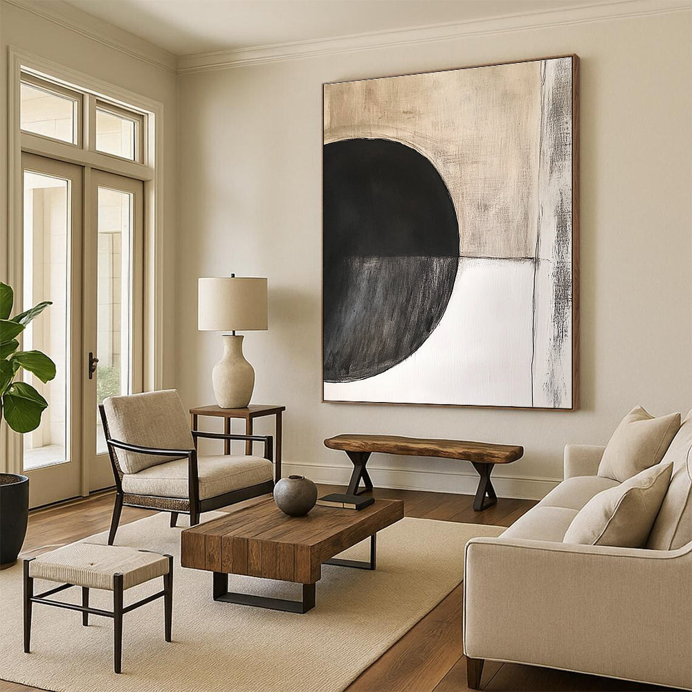 Large abstract painting featuring an oval black circle with dark grey texture on beige textured background by Peter Cresely.STSC664