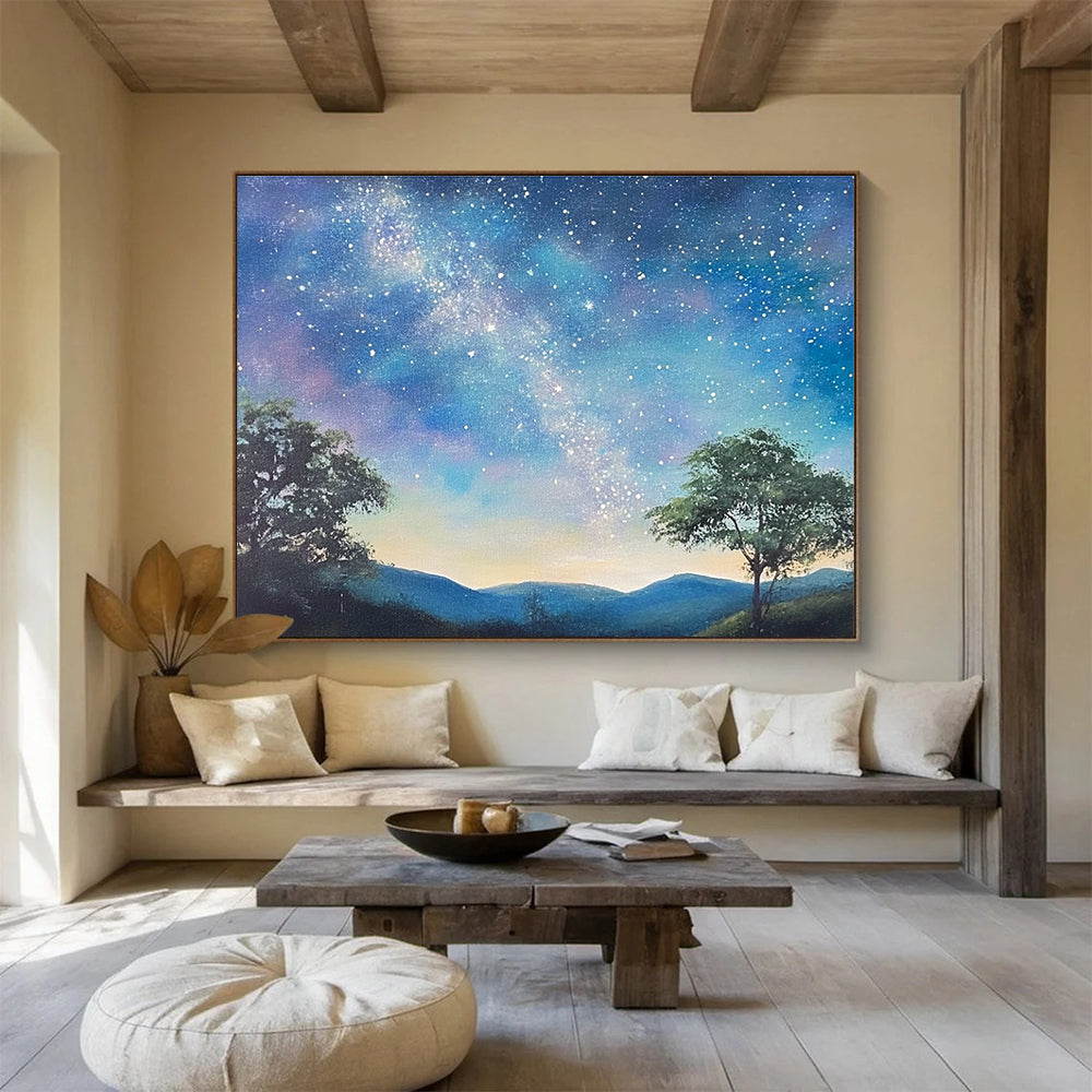 A large abstract painting featuring a serene starry sky with the Milky Way, silhouetted trees on hills, and a fantasy-inspired azure background.SC421