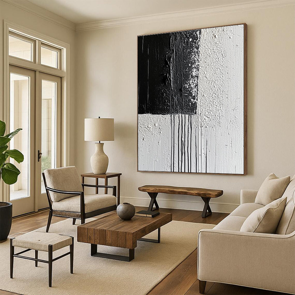 Large abstract painting with broad strokes and delicate paint drips on a textured canvas featuring a monochromatic gray color scheme.STSC539