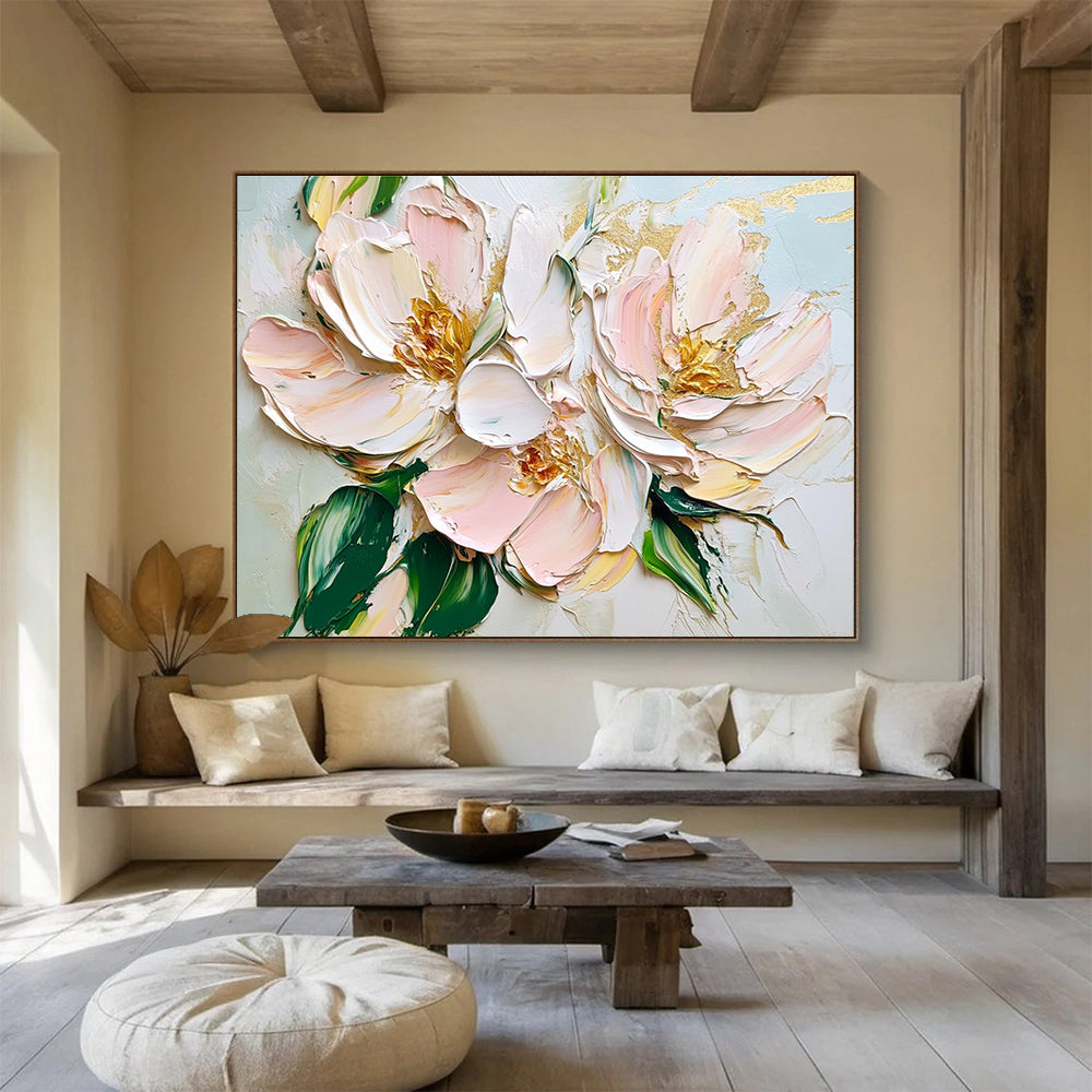 Large abstract oil painting featuring light pink and white flowers with green leaves and gold accents in a thick brushstroke palette knife style.SC123