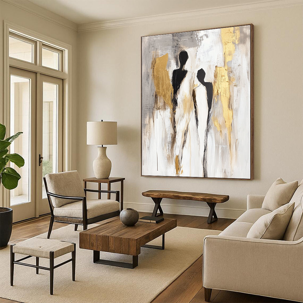 Large abstract painting in neutral tones with gold accents featuring soft gestural figures and delicate brush strokes on a light grey background.STSC440
