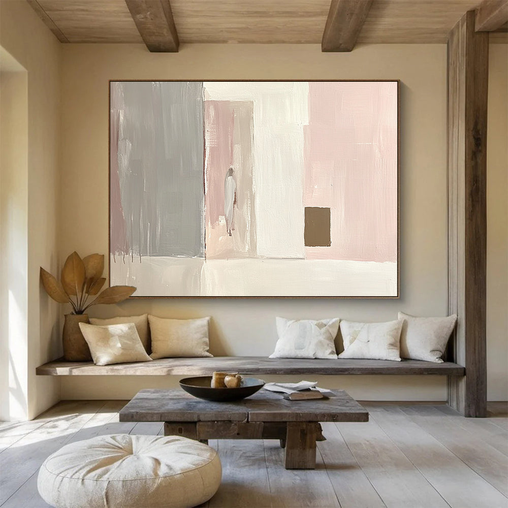 Large abstract painting in light pink and white with gray and a small brown square emphasizes minimalist brushstrokes and elegant simplicity in oil paint.SC223