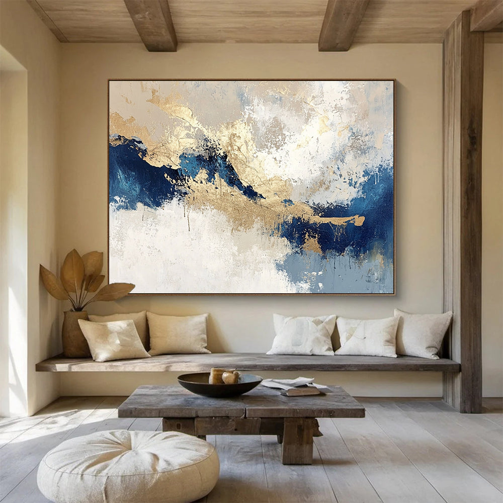 Large abstract painting in blue and gold on textured beige and white background featuring light gray and dark indigo tones for a stunning decor.SC023