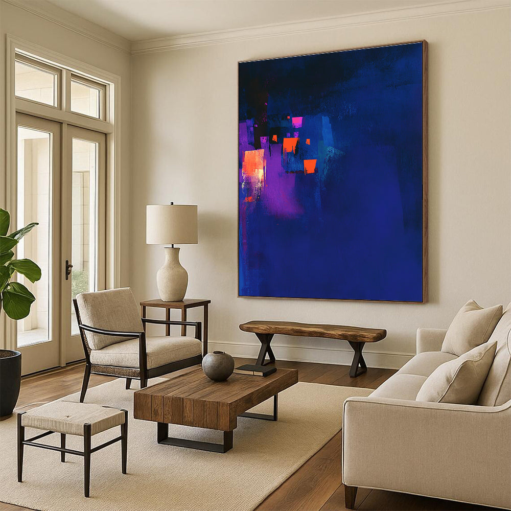 Large abstract painting in dark blue and violet with glowing orange highlights and a dark background capturing a chiaroscuro effect.STSC544