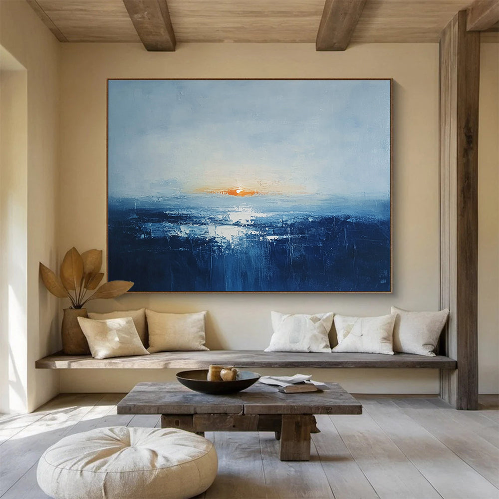 Abstract oil painting of an Irish landscape at sunrise featuring muted colors dark blue sea and an orange sun peeking over a grey skySC106