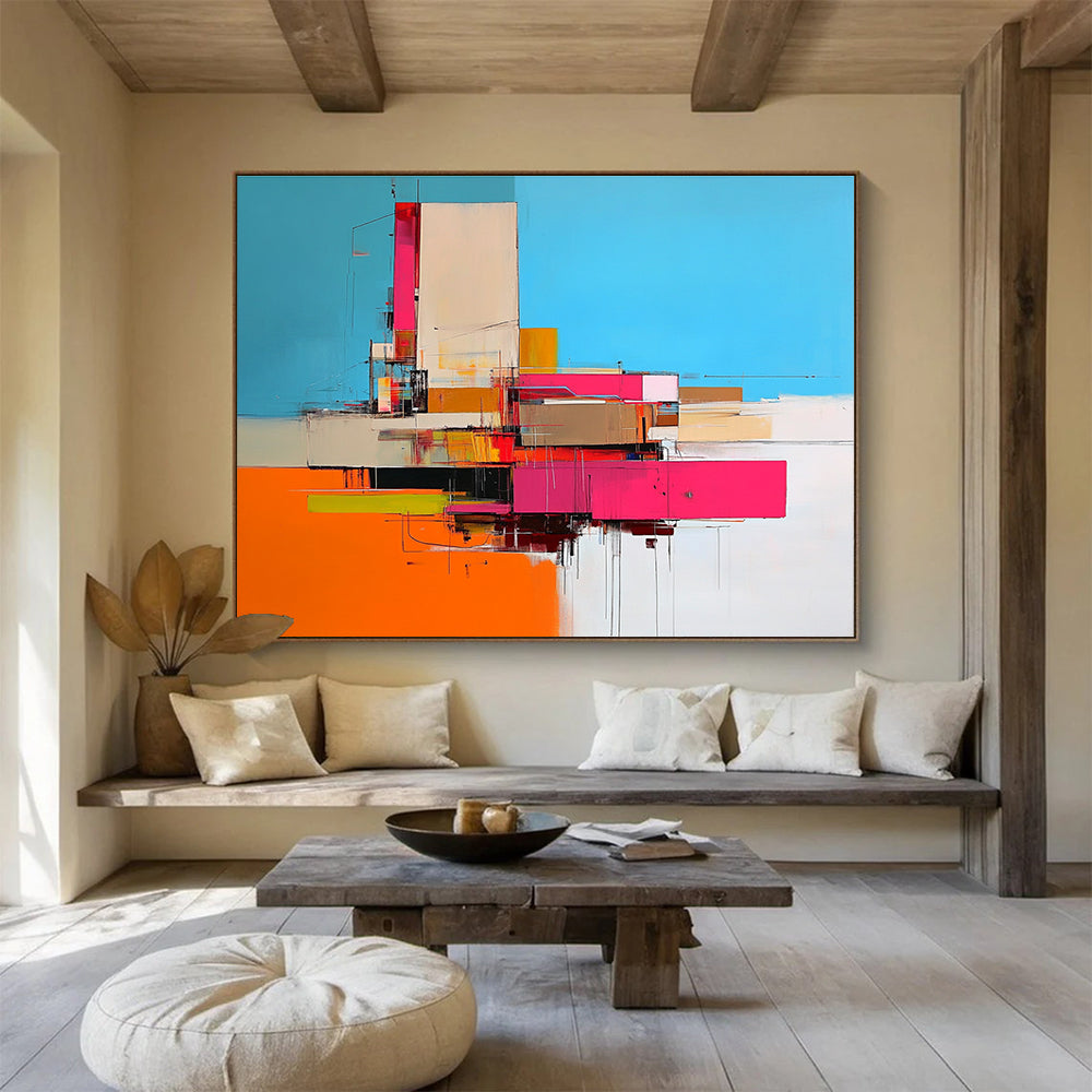 Large abstract painting of an industrial building in vibrant pink and orange hues against a blue backdrop capturing dynamic beauty.SC159