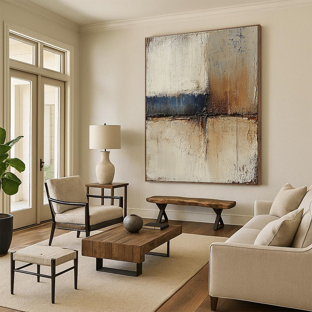Abstract landscape with neutral colors in earth tones of beige and brown accented by blue textured paint ideal for modern decor.STSC079