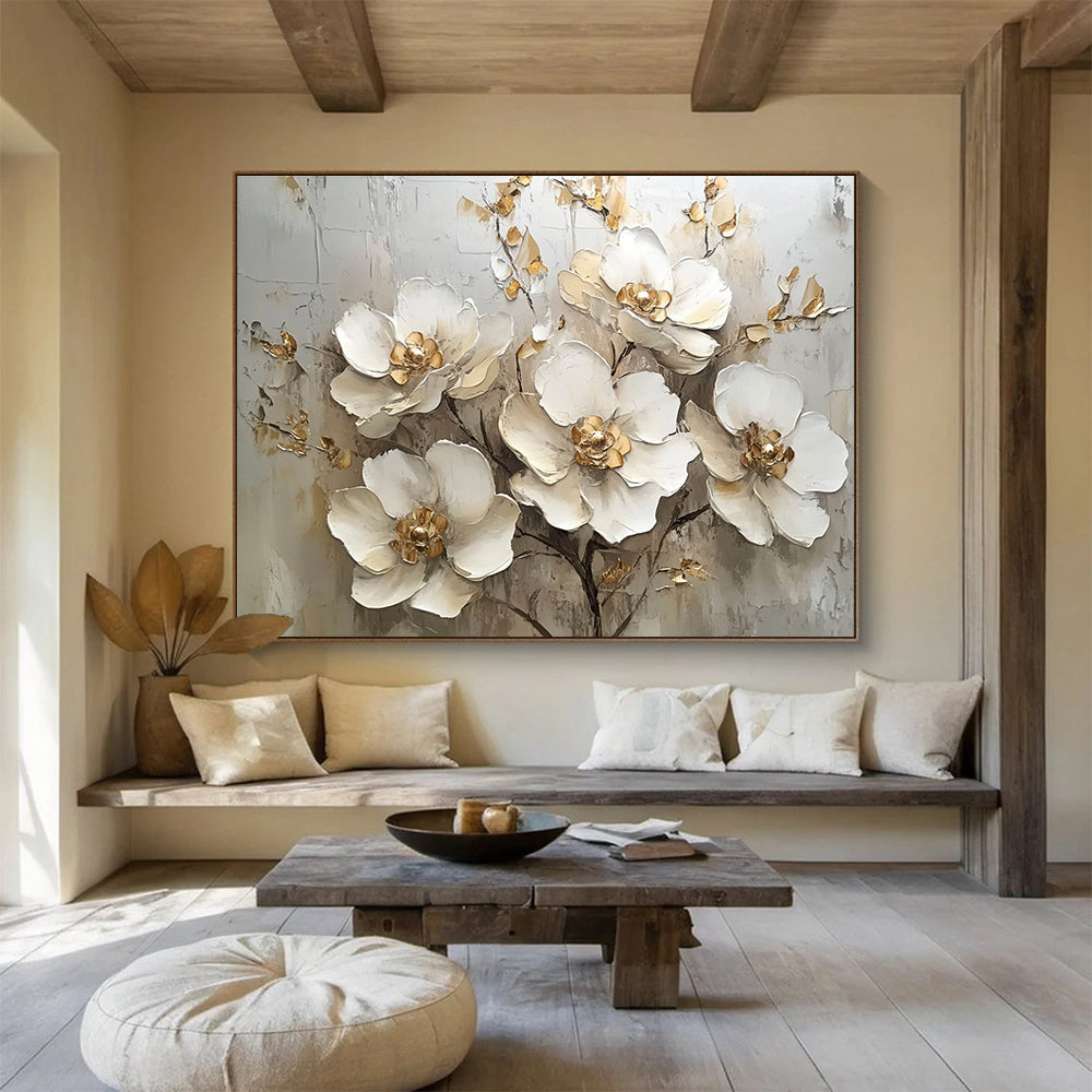 A large abstract painting featuring white flowers with gold accents on a white background, showcasing elegant details and soft lighting in a neutral palette.SC623