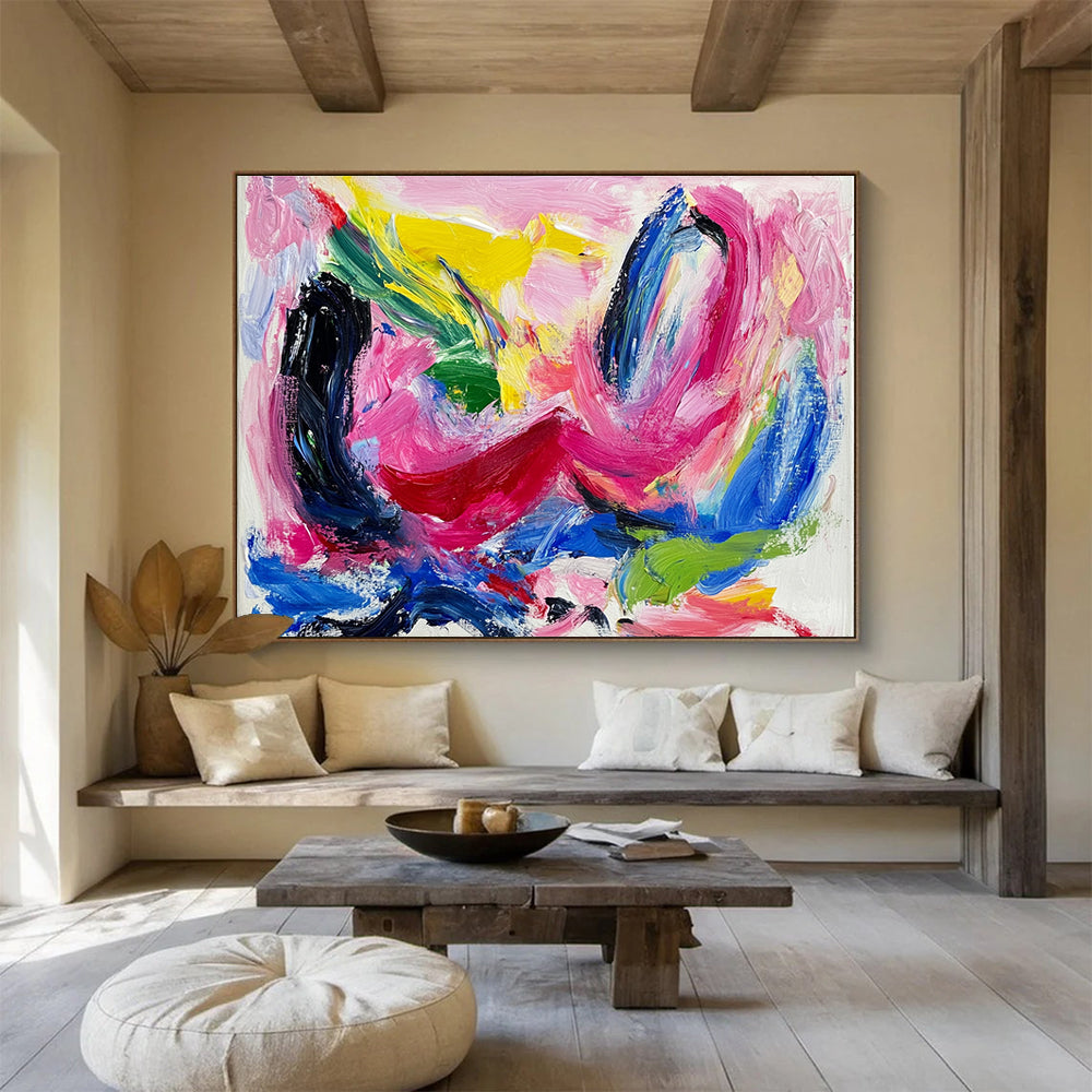 Large abstract painting featuring vibrant pink and blue hues thick brush strokes and dynamic black swirls with red lines and green shapes on a white backgroundSC150