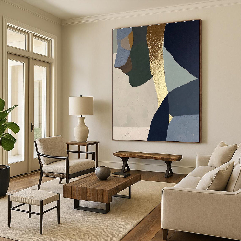 Abstract painting with gold foil depicting a woman in profile, blended neutral tones of sage green, blue, gray, beige, and navy blue.STSC756