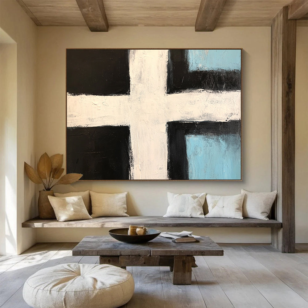 Abstract painting featuring a bold black and white cross with light blue accents and thick brush strokes in a minimalistic style.SC168