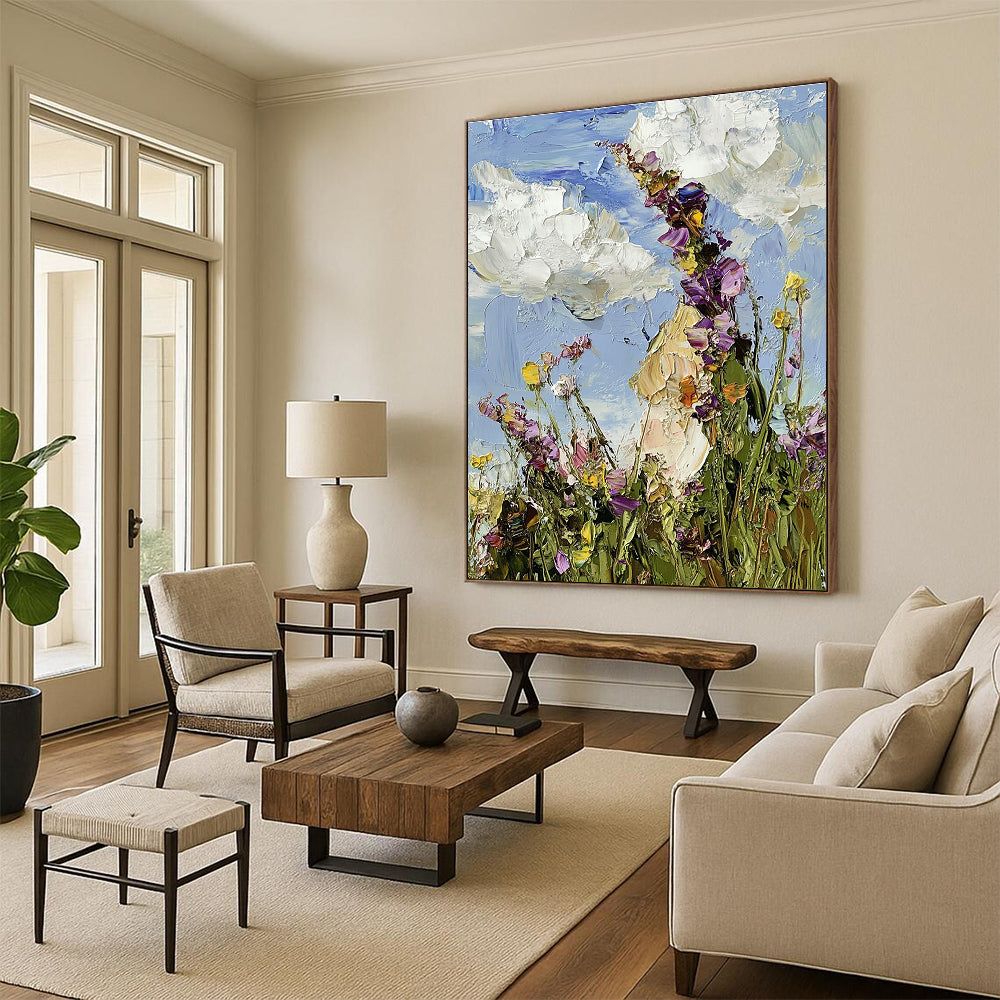 Large abstract oil painting featuring a colorful wildflower meadow under a blue sky with visible brushstrokes in an impressionist style.STSC1367