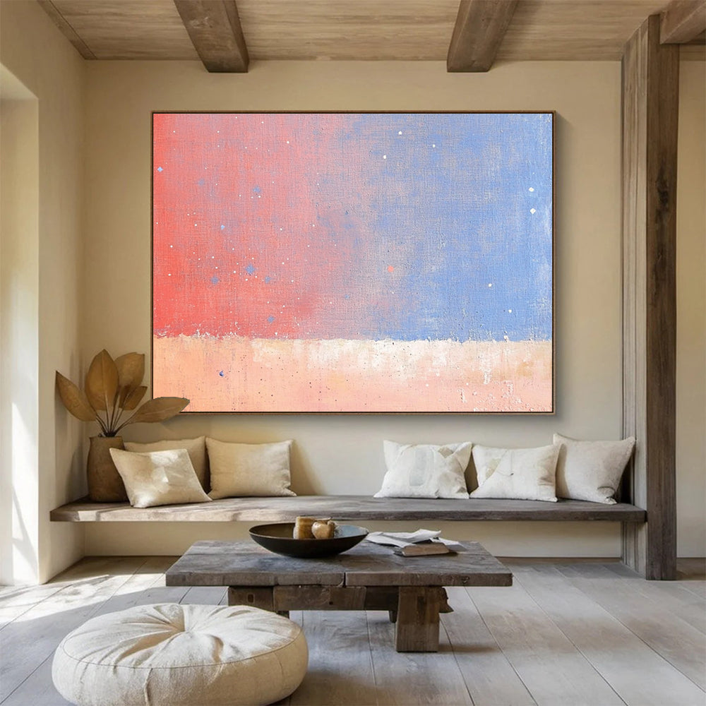 A large abstract painting depicting the sky and stars over an orange desert with soft pink and blue tones in a minimalist style.SC366