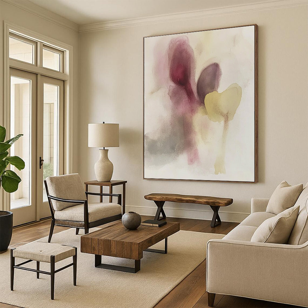 Large abstract painting featuring muted colors soft shapes resembling eggplant and flowers with subtle hints of faces in watercolor.STSC503