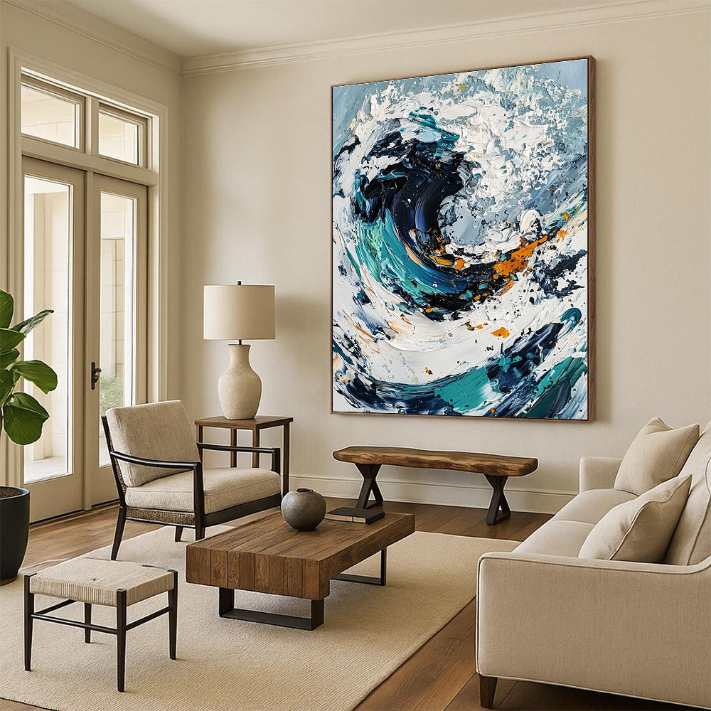 Large abstract painting of an ocean wave in white and blue tones with black center and colorful details created using a palette knife on canvas.STSC263