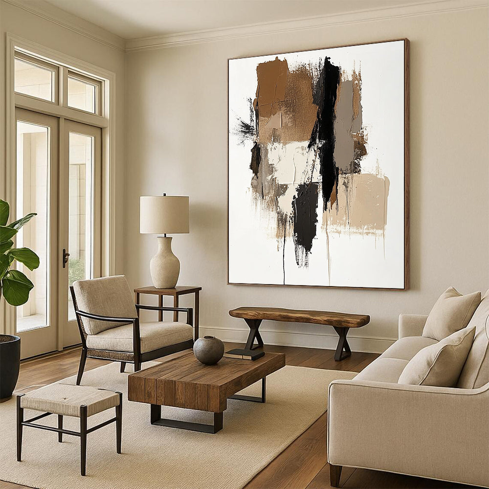 Large abstract painting featuring brown beige and white colors with a prominent gray shape and vertical navy blue detail.STSC677