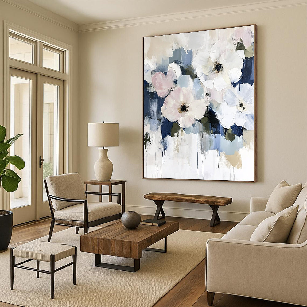 Large abstract floral painting in soft pinks and whites with hints of blue featuring minimalist style and soft brushstrokes on neutral tones.STSC056