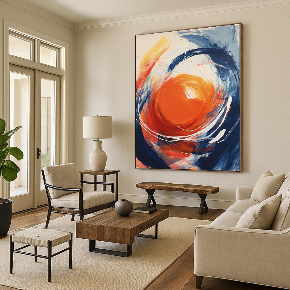 Large abstract painting featuring an orange orb with swirling white energy against a light gray background showcasing vibrant colors and dynamic brushstrokes.STSC744