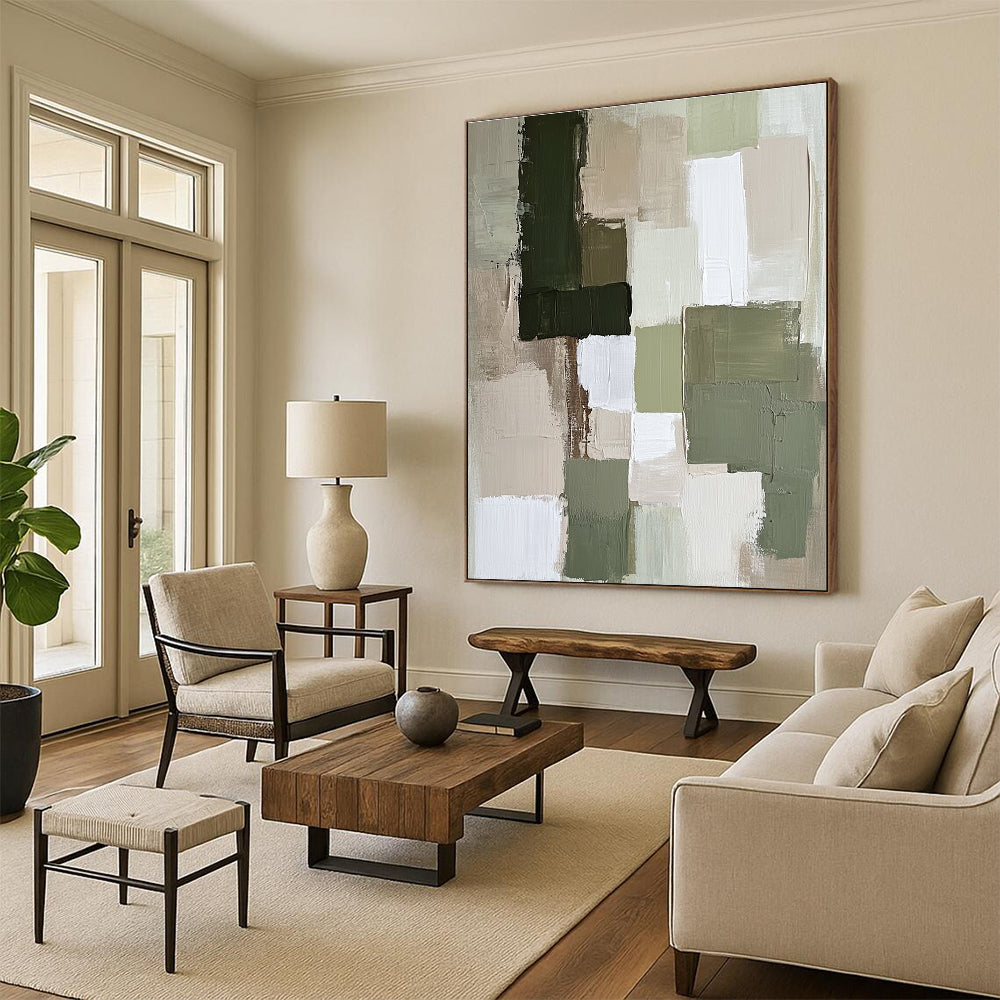 Large abstract painting featuring soft neutral tones like sage green and beige with dynamic textures and shapes that create a calm atmosphere.STSC767