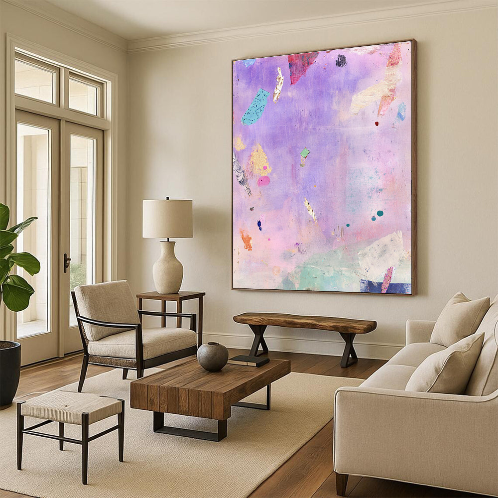 A large abstract painting featuring whimsical floating objects in lavender and pink with vintage fabric pieces and a serene dynamic composition that evokes joy.STSC1207