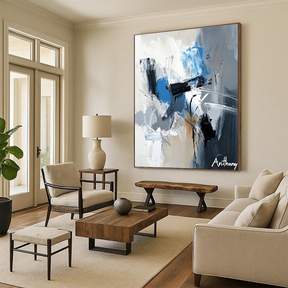 Large abstract painting featuring the name Anthony in white gray and blue tones with dynamic brush strokes and rich textures.STSC450