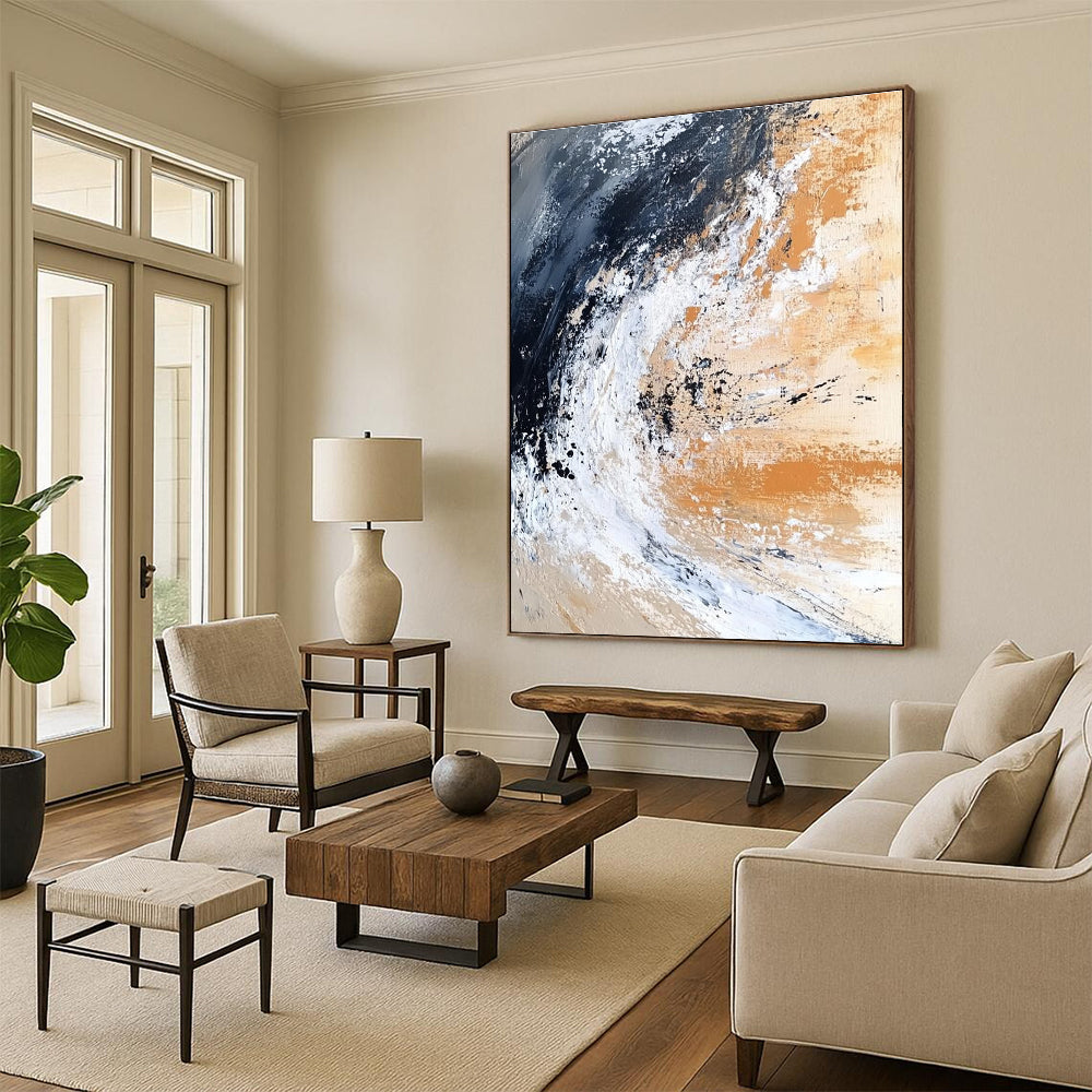 Large abstract painting depicting an ocean wave crashing on the shore in dark black and white with beige brown gray and rust orange.STSC555