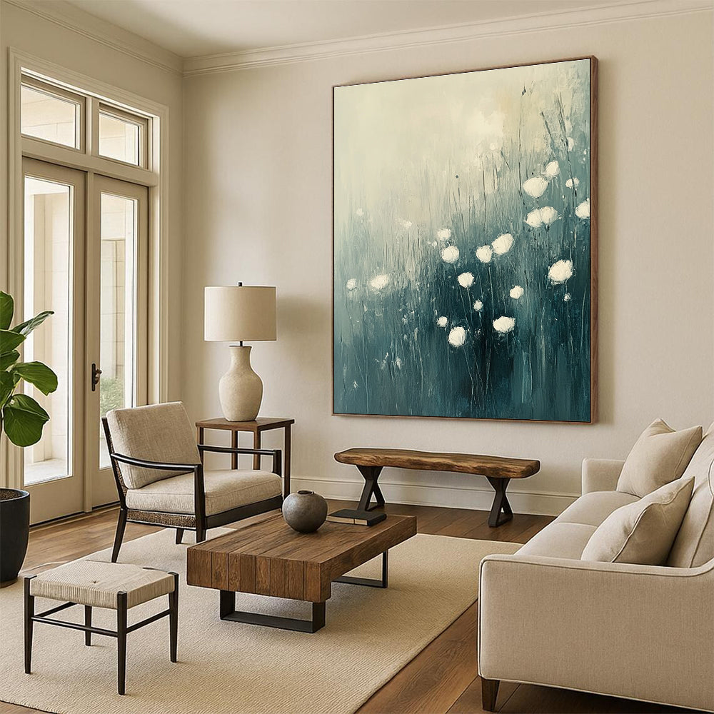 Large abstract oil painting of flowers in grass featuring white and light blue tones with muted colors, perfect for enhancing any space.STSC184