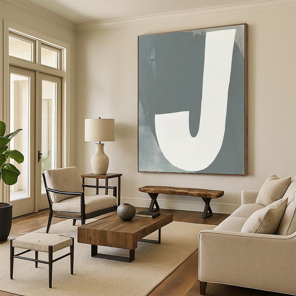 Large abstract painting featuring white and gray tones resembling a J with a neutral background promoting calmness and modern elegance.STSC1113