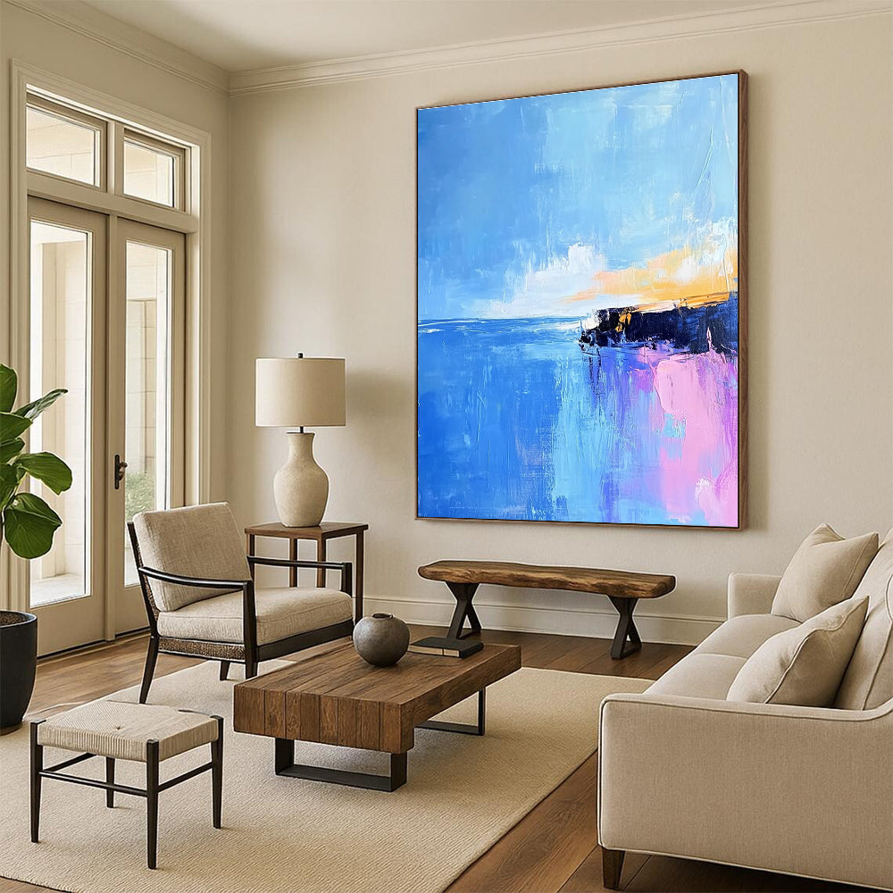 Large abstract painting of Pointe du Hoc's rocky coast in light pink and baby-blue hues with long brush strokes against a vibrant blue sky.STSC598