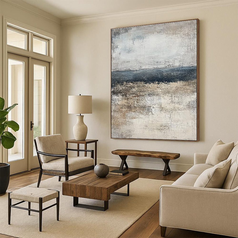Large abstract painting of the ocean in muted gray and beige tones, featuring a calming neutral color palette that enhances any space.STSC491