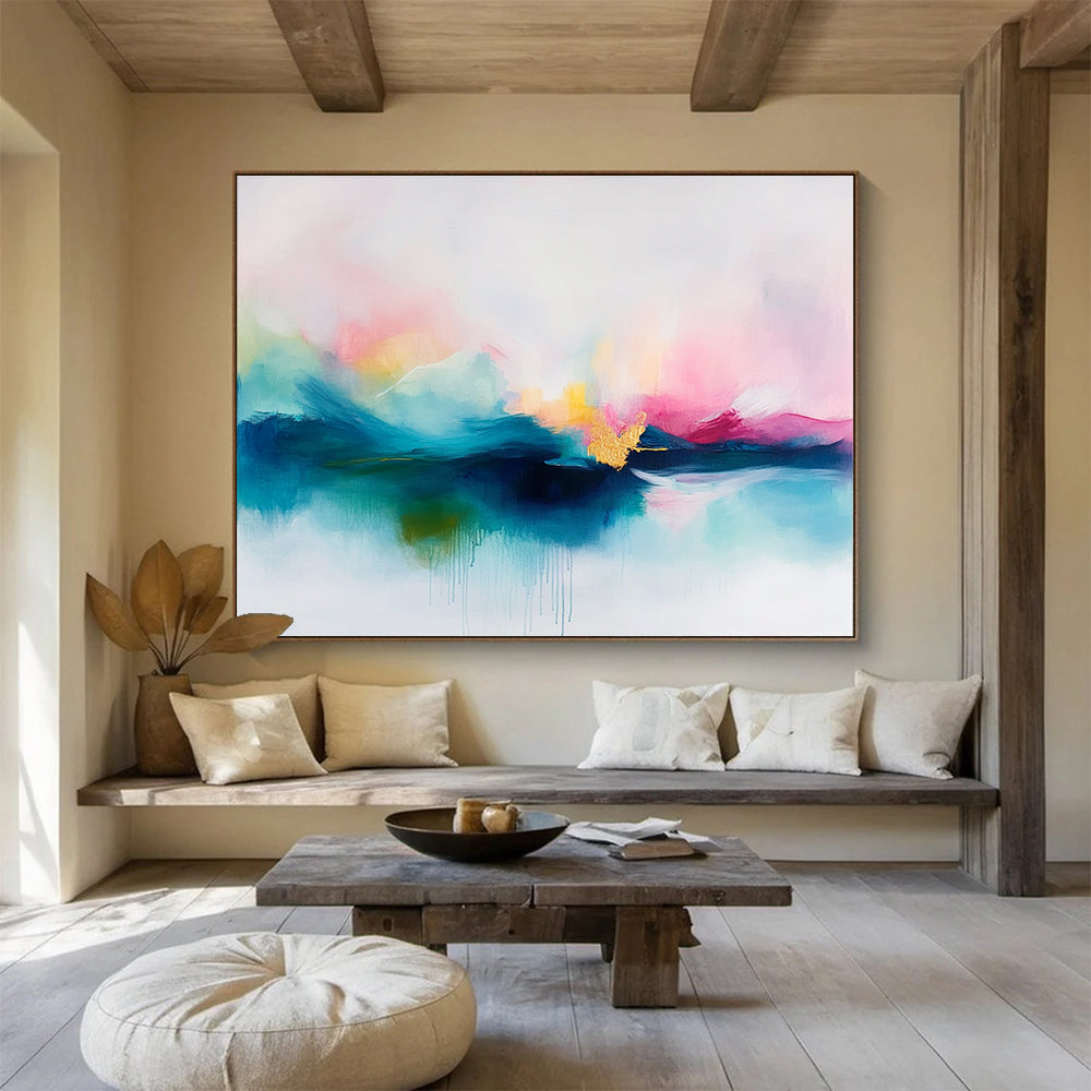 A large abstract painting featuring soft pastel colors in pinks and blues with delicate gold accents on a serene white background.SC383