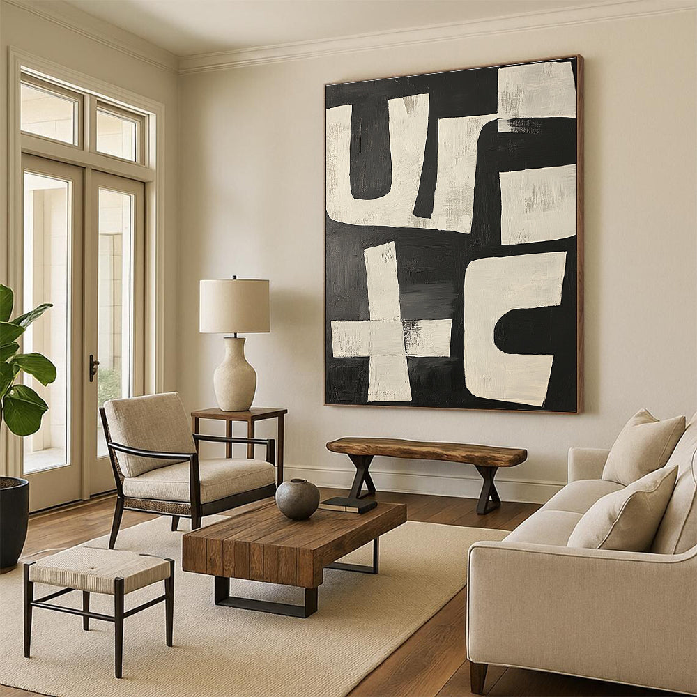 Large abstract painting featuring dynamic black and white shapes resembling the word use in a bold and energetic composition.STSC1133