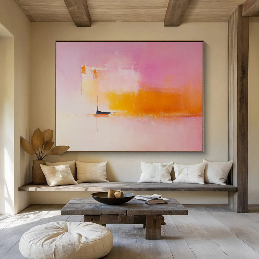 Large abstract painting featuring light pink and orange hues with a small boat on the horizon in a minimalist blurred landscape.SC330