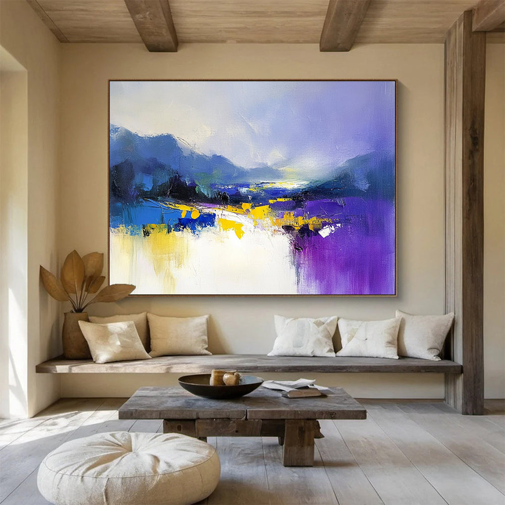 Large abstract painting featuring soft purple and blue hues with yellow accents created using loose brush strokes for a calming effect.SC317