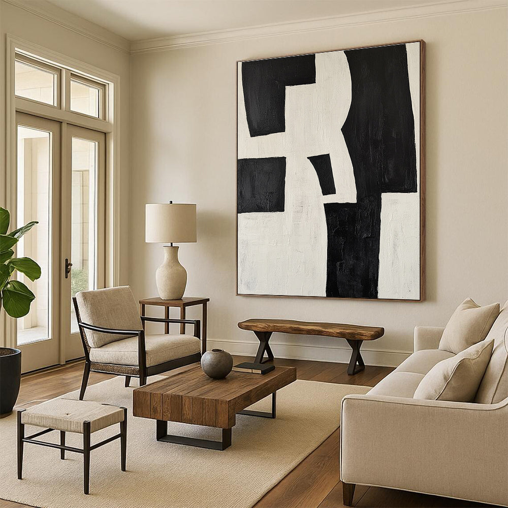 Large abstract painting in black and white featuring deconstructed shapes creating a striking visual impact ideal for modern decor.STSC389