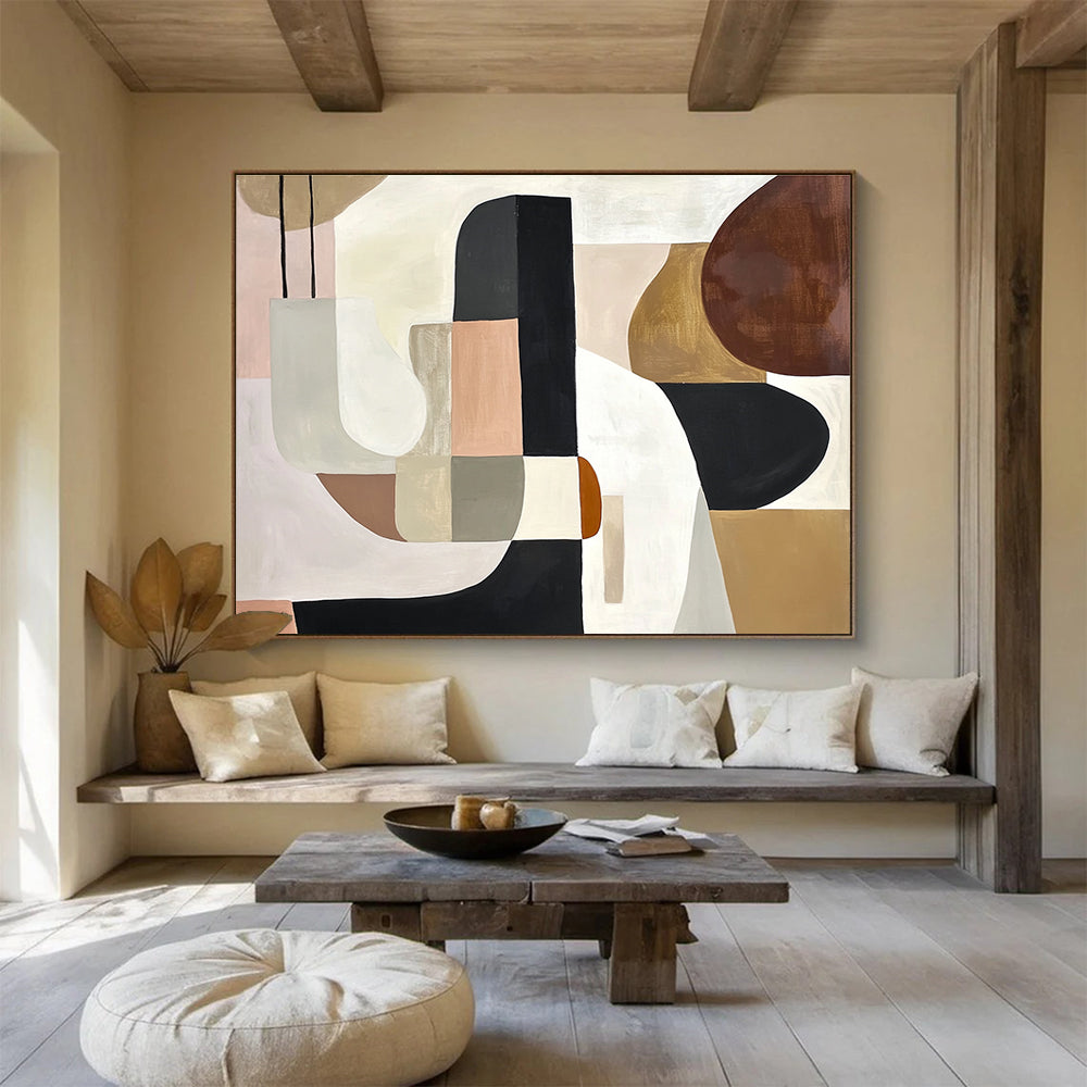 An abstract painting featuring elegant shapes in white, black, and brown, accented with soft beige, pink, grey, and cream tones and brown wood elements.SC352