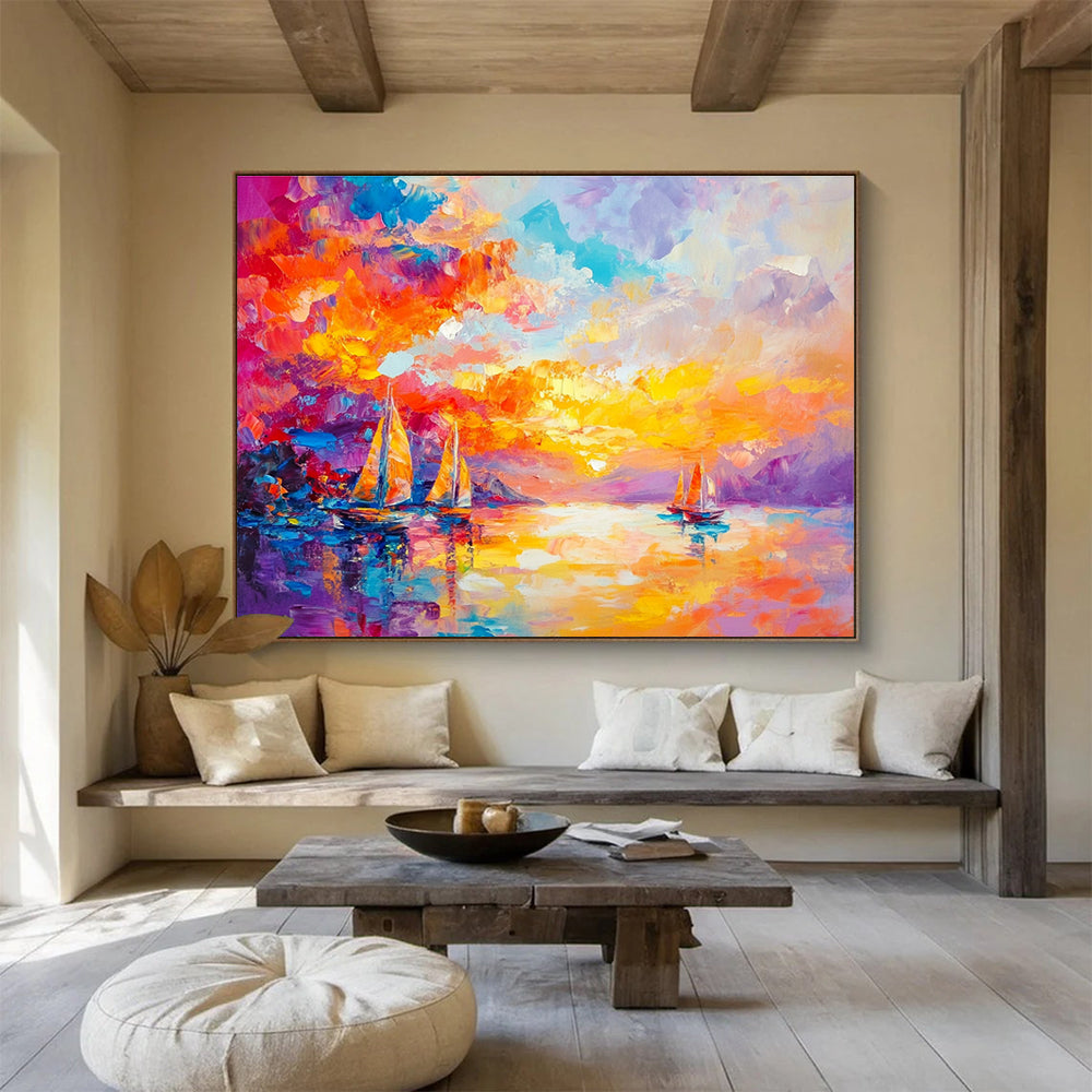 Large abstract painting capturing a vibrant sunset over the sea with sailboats in a colorful and dreamlike style.SC180