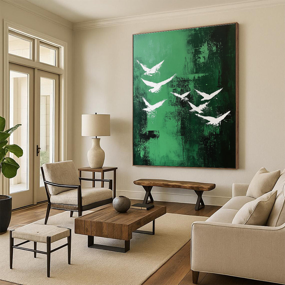 Abstract painting featuring white birds soaring over a vibrant emerald green landscape in a minimalistic style.STSC362