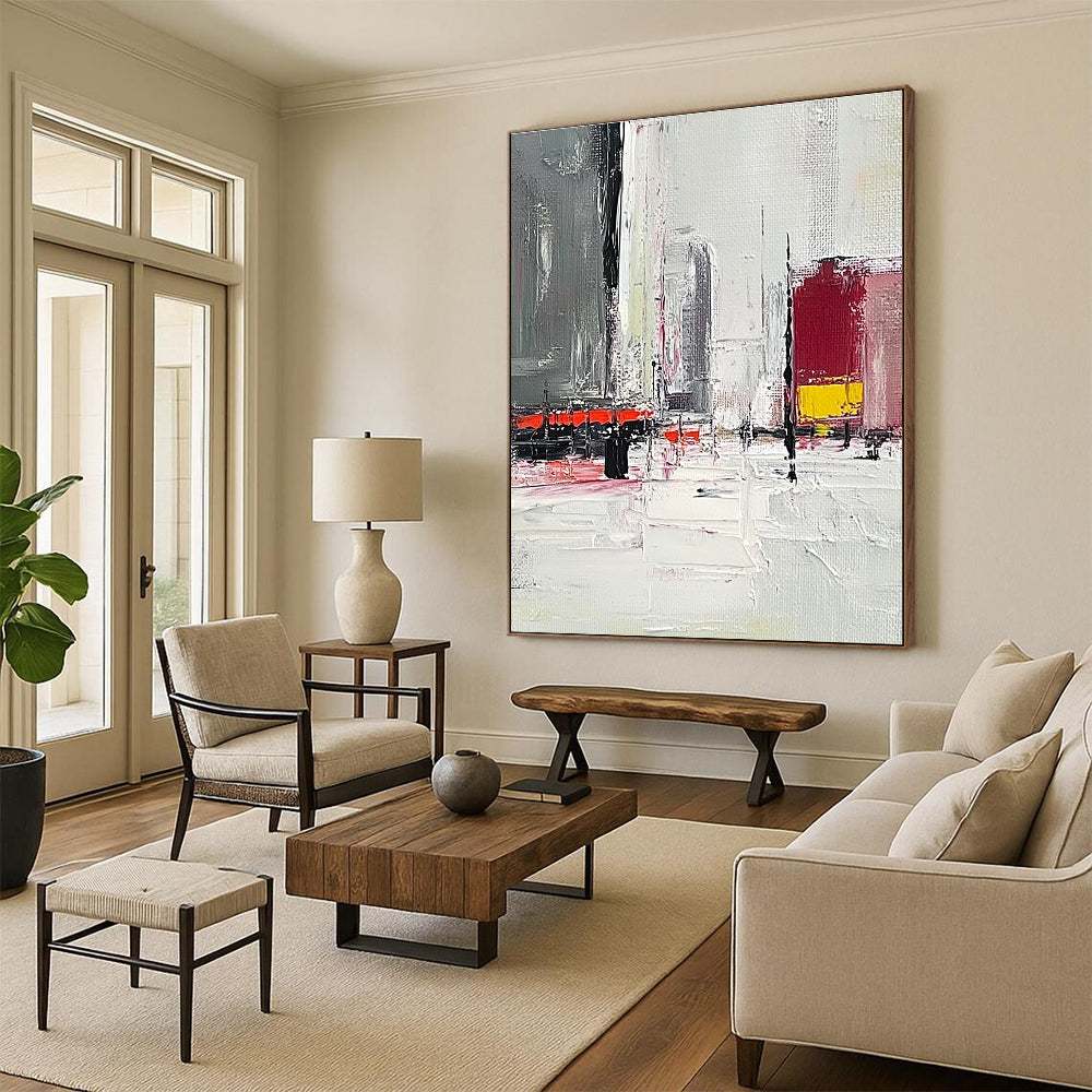 Large abstract painting featuring a grey and white urban landscape with red and yellow accents and thick brush strokes on a textured canvas.STSC154