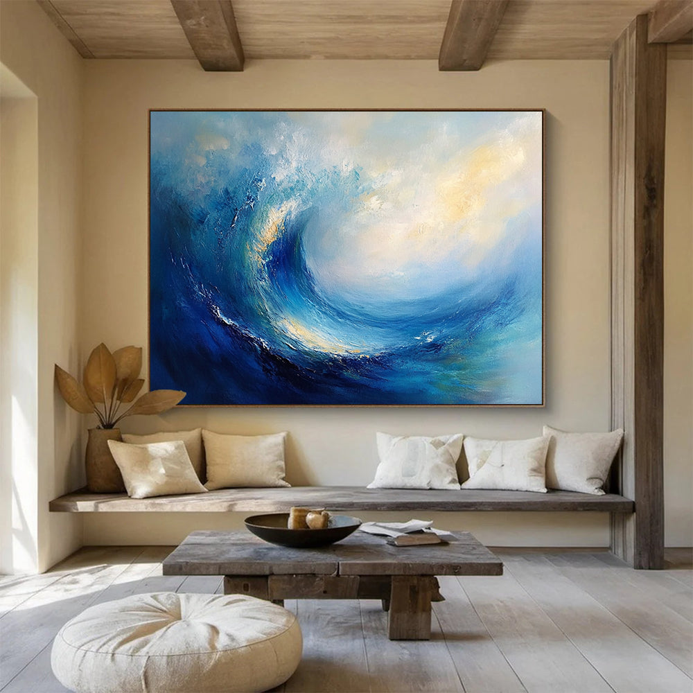 Large abstract oil painting of an ocean wave featuring blue and teal colors with thick brush strokes and white clouds in the background.SC108