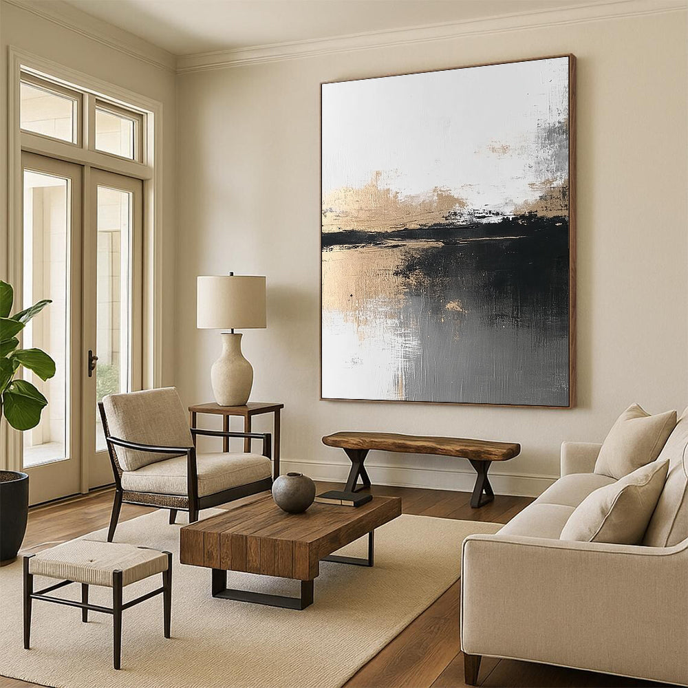 Abstract painting featuring atmospheric grey and gold tones with a minimalist landscape evoking calmness and serenity through brush strokes and textured water reflection.STSC387