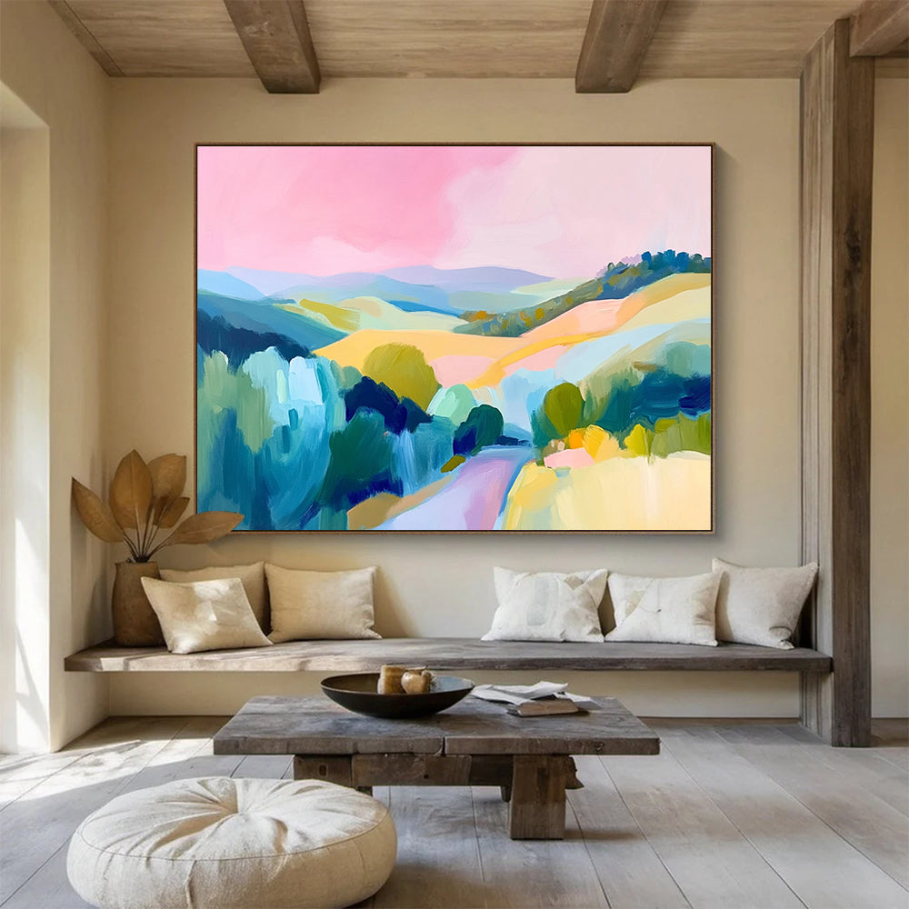Large abstract painting of the French countryside featuring rolling hills a pink sky and vibrant blue green and yellow brush strokes.SC129