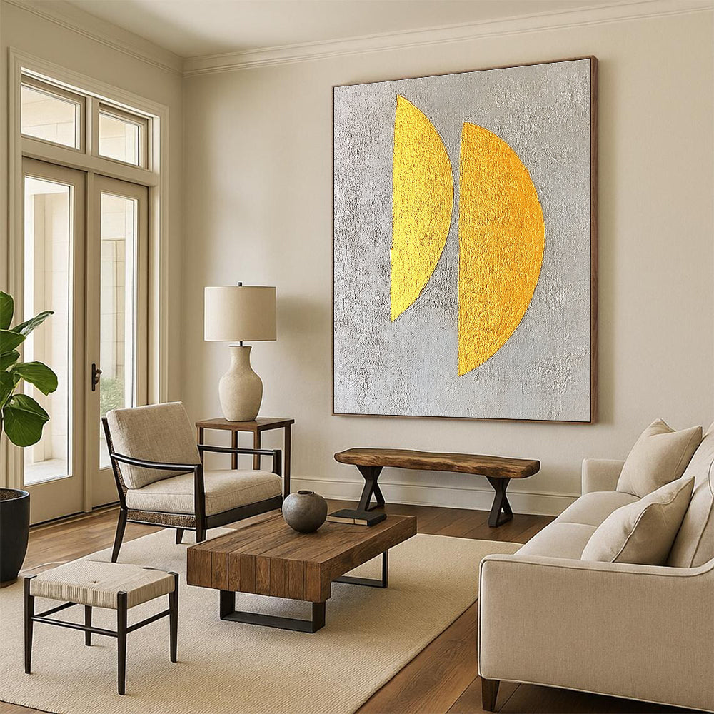 Large abstract painting featuring two yellow semicircles on a textured grey background with gold leaf highlights in a minimalist style.STSC356