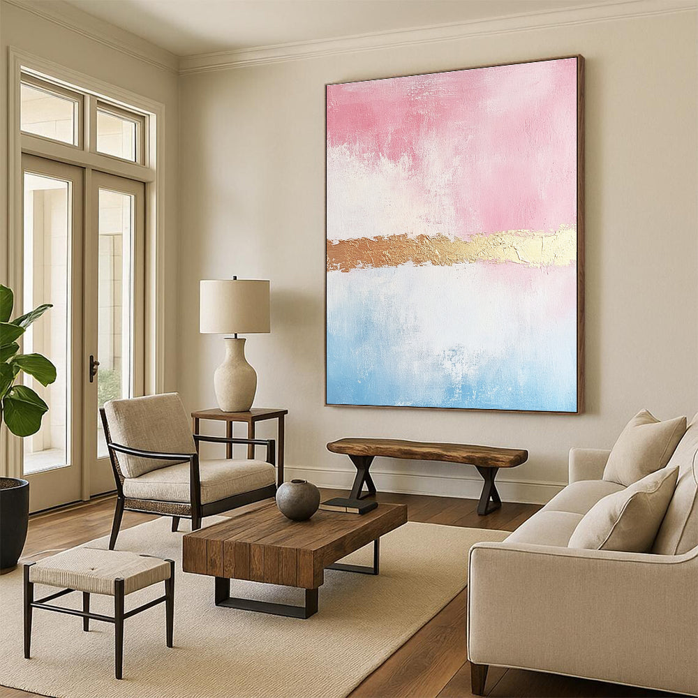 Large abstract painting with soft pink and gold tones textured brushstrokes and a delicate golden line enhancing its minimalist elegance.STSC454