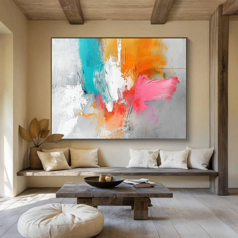 Large abstract painting featuring a light gray background with orange and pink splashes, white brush strokes, and vibrant blue accents.SC148