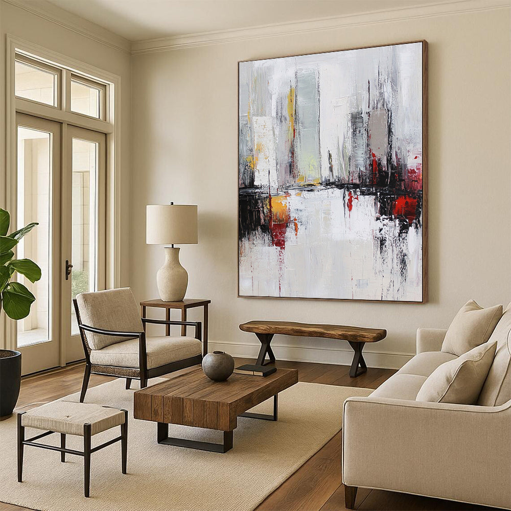 Large abstract oil painting of a cityscape in white and grey tones with red accents featuring dynamic loose brush strokes.STSC162